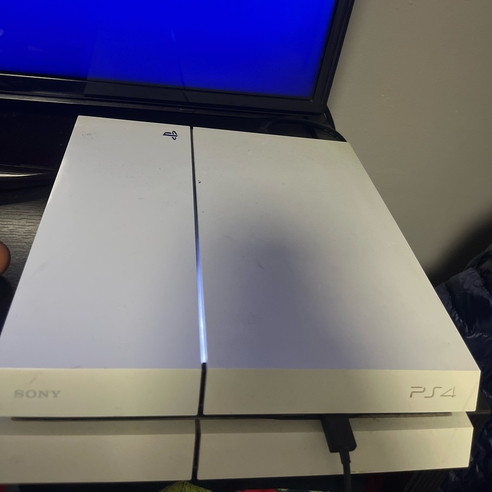 Play station 4 with two wireless controllers, PRICE NEGOTIABLE